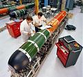 Click image for larger version

Name:	Mk_48_torpedo_maintenance_1982.jpg
Views:	226
Size:	19.8 KB
ID:	130559